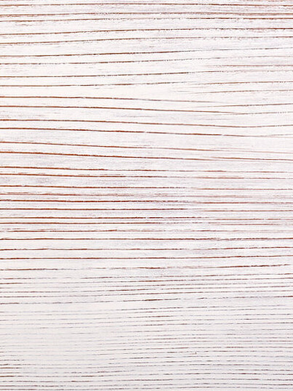 Sample Weiße Musterfläche mit Relief des Holzes zu sehen in schwarzer aufgeklappter Verpackung