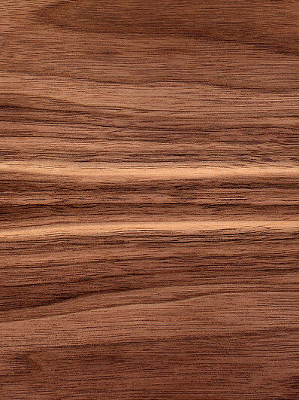 Sample Musterfläche eines dunklen Holzes in schwarzer aufgeklappter Verpackung